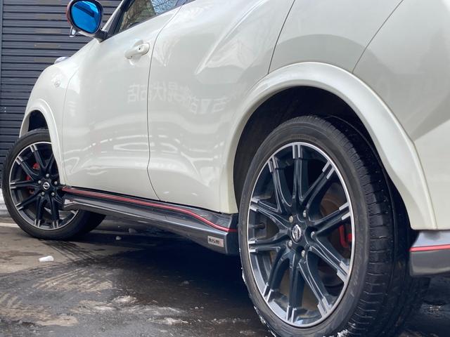 ジューク ニスモ　４ＷＤ　スポーティチューンターボ　社外マフラー　純正エンジンスターター　純正ナビ　地デジＴＶ　バックカメラ　専用シート　ＨＩＤヘッドランプ　リアフォグランプ　ＥＴＣ（9枚目）