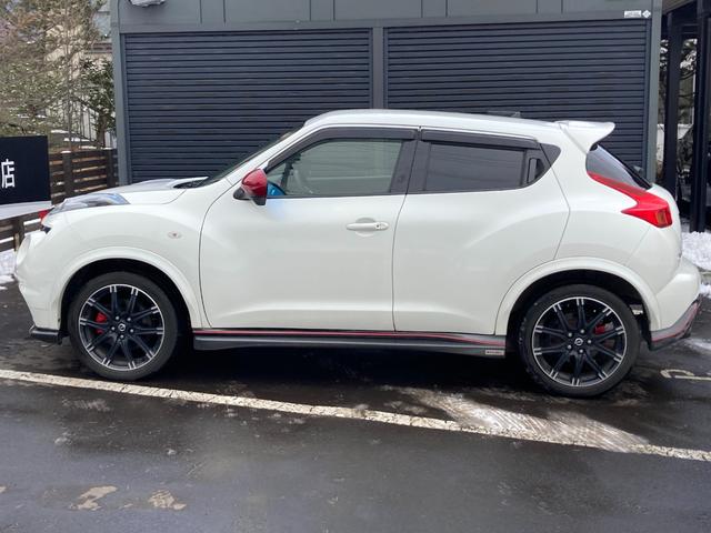 ジューク ニスモ　４ＷＤ　スポーティチューンターボ　社外マフラー　純正エンジンスターター　純正ナビ　地デジＴＶ　バックカメラ　専用シート　ＨＩＤヘッドランプ　リアフォグランプ　ＥＴＣ（14枚目）