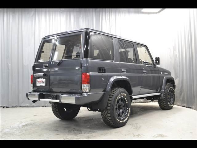 ランドクルーザープラド SXワイド ディーゼルターボ オートマ リフトアップ ワイドボディ オープンカントリーRTタイヤ ブラックシートカバー 地デジナビ ブルートゥース キーレス ETC リアヒーター 寒冷地 1ナンバー(12枚目)