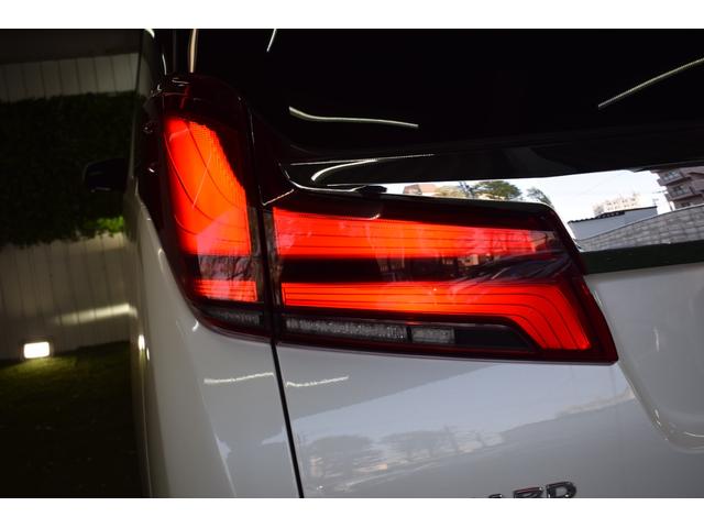 アルファードハイブリッド エグゼクティブラウンジＳ　４ＷＤ／本州仕入／ツインムーンルーフ／ＪＢＬサウンド／３眼ＬＥＤライト／１５００Ｗ電源／デジタルミラー／全方位カメラ／メーカーナビ／フリップダウン／ビルトインＥＴＣ／本革シート／ベンチレーション（21枚目）