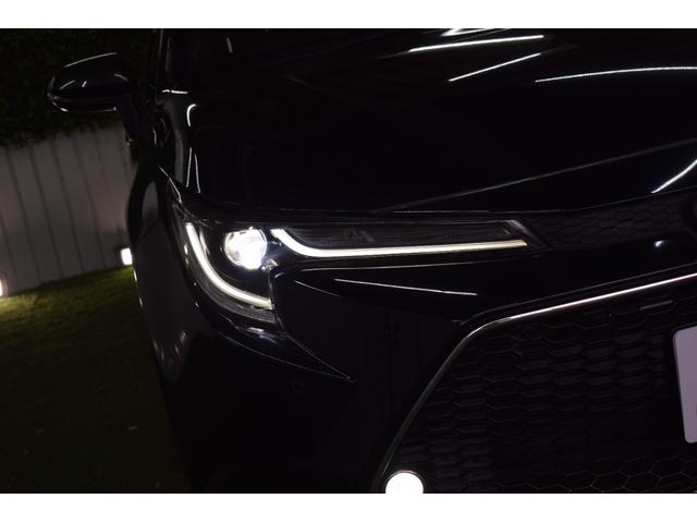 カローラツーリング ハイブリッド ダブルバイビー 4WD/本州仕入/ハーフレザーシート/ドラレコ/LEDライト/ステアリングヒーター/ビルトインETC/ディスプレイオーディオ/DVDデッキ/シートヒーター/バックカメラ/純正17インチAW(4枚目)