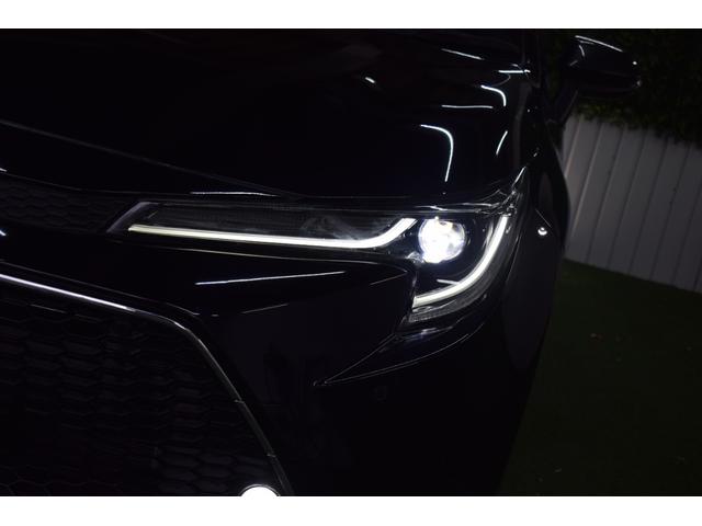 カローラツーリング ハイブリッド ダブルバイビー 4WD/本州仕入/ハーフレザーシート/ドラレコ/LEDライト/ステアリングヒーター/ビルトインETC/ディスプレイオーディオ/DVDデッキ/シートヒーター/バックカメラ/純正17インチAW(6枚目)