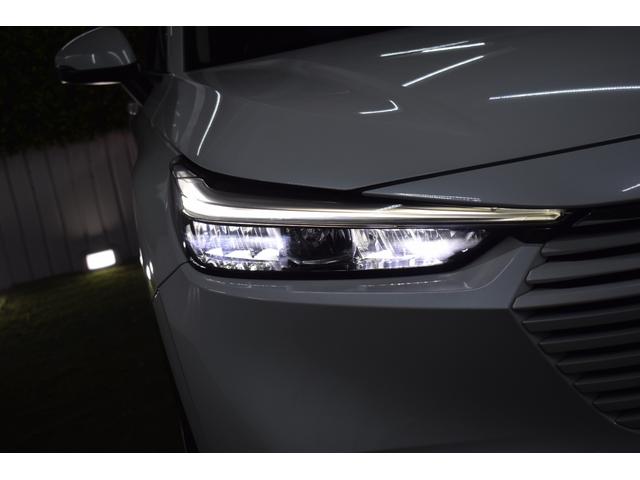 ヴェゼル e:HEV Z 4WD/ワンオーナー/寒冷地仕様/純正エンスタ/前後ドラレコ/ワイヤレス充電/ミラーヒーター/コーナーセンサー/ハーフレザーシート/LEDヘッドライト/電動パーキング/ブレーキホールド/バックカメラ(4枚目)