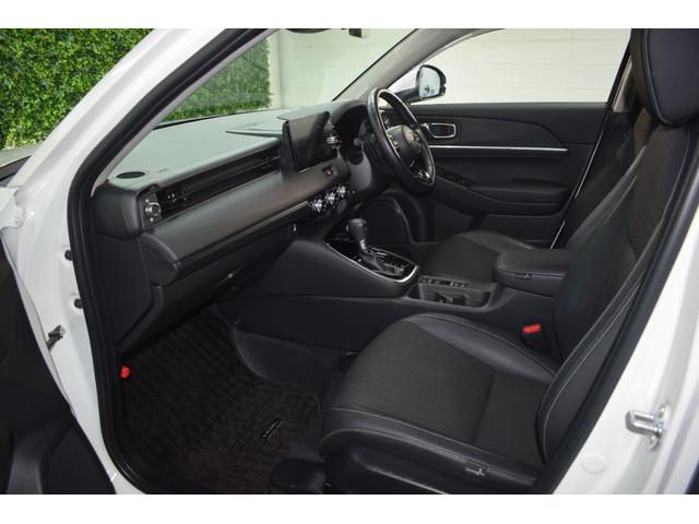 ヴェゼル e:HEV Z 4WD/ワンオーナー/寒冷地仕様/純正エンスタ/前後ドラレコ/ワイヤレス充電/ミラーヒーター/コーナーセンサー/ハーフレザーシート/LEDヘッドライト/電動パーキング/ブレーキホールド/バックカメラ(33枚目)