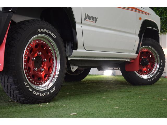 ジムニー ＸＣ　４ＷＤ／本州仕入／５速ＭＴ／ＷＯＲＫ１６インチＡＷ／シートカバー／ＭＴタイヤ／社外８インチナビ／ルーフキャリア／ＬＥＤヘッドライト／バックモニター／ドラレコ／マッドフラップ／リバイバルＢサイドデカール（20枚目）