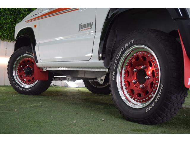 ジムニー ＸＣ　４ＷＤ／本州仕入／５速ＭＴ／ＷＯＲＫ１６インチＡＷ／シートカバー／ＭＴタイヤ／社外８インチナビ／ルーフキャリア／ＬＥＤヘッドライト／バックモニター／ドラレコ／マッドフラップ／リバイバルＢサイドデカール（21枚目）