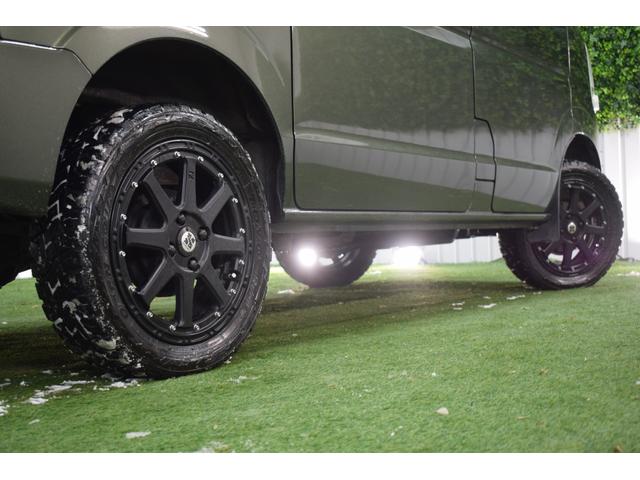 エブリイ ジョインターボ 4WD/ターボ/5速マニュアル/シートカバー/リフトアップ/ルーフキャリア/マッドタイヤ/15インチアルミ/社外オーディオ/キーレスキー/両側スライドドア/LEDヘッドライト/フルフラットシート(27枚目)