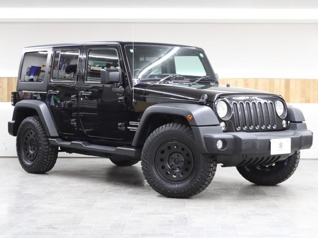 ジープ・ラングラーアンリミテッド スポーツ 4WD JK後期最終モデル オーストラリア製MONSTA 新品タイヤ JEEP純正スチールホイール ストラーダナビ地デジBカメラ Bluetooth ETC(4枚目)