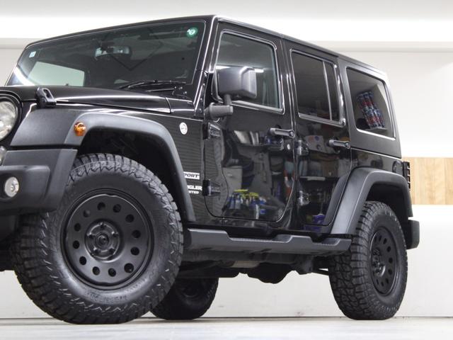 ジープ・ラングラーアンリミテッド スポーツ 4WD JK後期最終モデル オーストラリア製MONSTA 新品タイヤ JEEP純正スチールホイール ストラーダナビ地デジBカメラ Bluetooth ETC(5枚目)