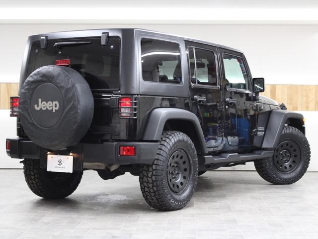 ジープ・ラングラーアンリミテッド スポーツ 4WD JK後期最終モデル オーストラリア製MONSTA 新品タイヤ JEEP純正スチールホイール ストラーダナビ地デジBカメラ Bluetooth ETC(8枚目)