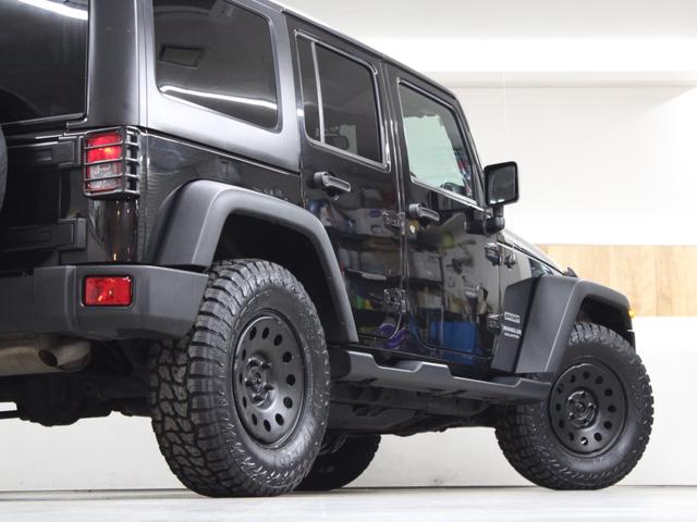 ジープ・ラングラーアンリミテッド スポーツ 4WD JK後期最終モデル オーストラリア製MONSTA 新品タイヤ JEEP純正スチールホイール ストラーダナビ地デジBカメラ Bluetooth ETC(9枚目)