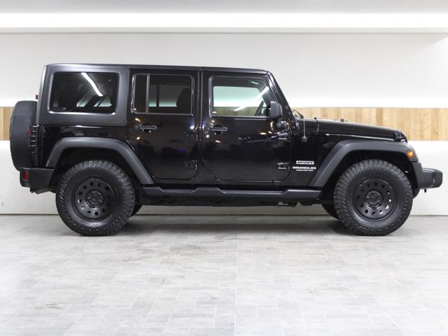 ジープ・ラングラーアンリミテッド スポーツ 4WD JK後期最終モデル オーストラリア製MONSTA 新品タイヤ JEEP純正スチールホイール ストラーダナビ地デジBカメラ Bluetooth ETC(10枚目)