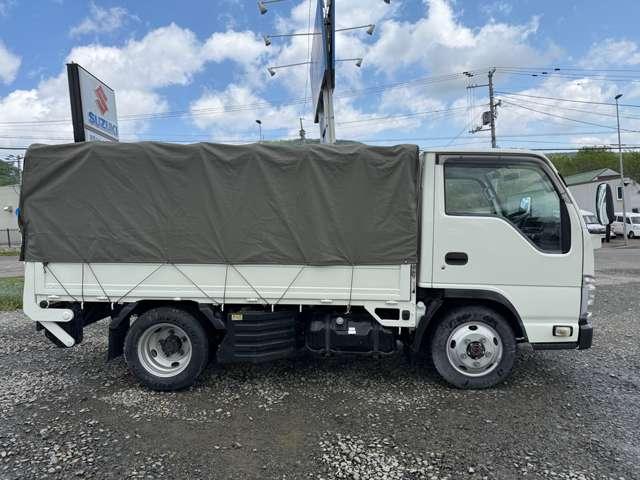 タイタントラック フルワイドロー　４ＷＤ　インタークラーラーターボディーゼル　スムーサＥＸ　１．５ｔ積　アーム式パワーゲート付　幌車　キーレス　４ナンバー　シャーシー塗装　スタッドレスタイヤ（ホイール付）付（3枚目）