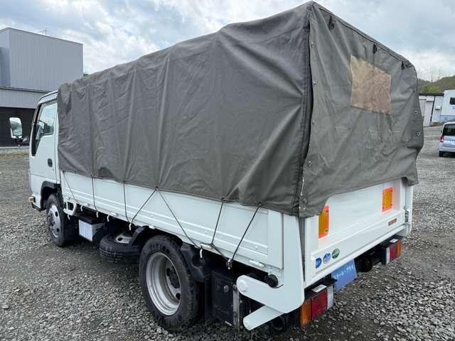 タイタントラック フルワイドロー　４ＷＤ　インタークラーラーターボディーゼル　スムーサＥＸ　１．５ｔ積　アーム式パワーゲート付　幌車　キーレス　４ナンバー　シャーシー塗装　スタッドレスタイヤ（ホイール付）付（6枚目）