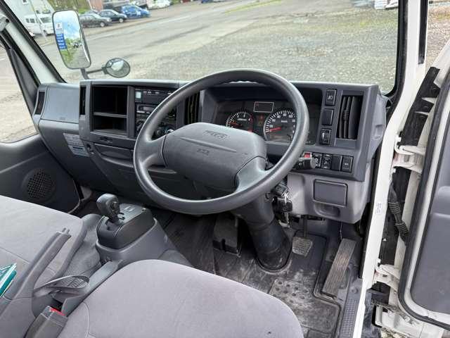 タイタントラック フルワイドロー　４ＷＤ　インタークラーラーターボディーゼル　スムーサＥＸ　１．５ｔ積　アーム式パワーゲート付　幌車　キーレス　４ナンバー　シャーシー塗装　スタッドレスタイヤ（ホイール付）付（10枚目）