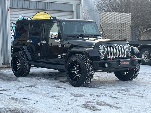 ジープ・ラングラーアンリミテッド サハラ　４ＷＤ　ディーラー車　ナビ　地デジ　サイドカメラ　バックカメラ　オーバーフェンダー　ホイール２０インチ　タイヤ３３×１２．５Ｒ２０　メッキパーツ（4枚目）