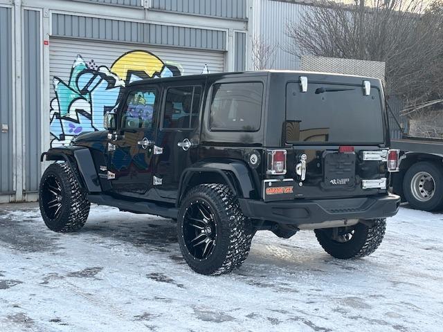 ジープ・ラングラーアンリミテッド サハラ　４ＷＤ　ディーラー車　ナビ　地デジ　サイドカメラ　バックカメラ　オーバーフェンダー　ホイール２０インチ　タイヤ３３×１２．５Ｒ２０　メッキパーツ（7枚目）