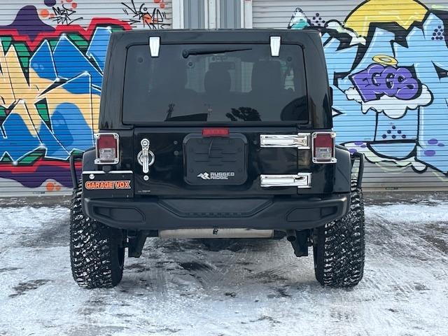 ジープ・ラングラーアンリミテッド サハラ　４ＷＤ　ディーラー車　ナビ　地デジ　サイドカメラ　バックカメラ　オーバーフェンダー　ホイール２０インチ　タイヤ３３×１２．５Ｒ２０　メッキパーツ（9枚目）