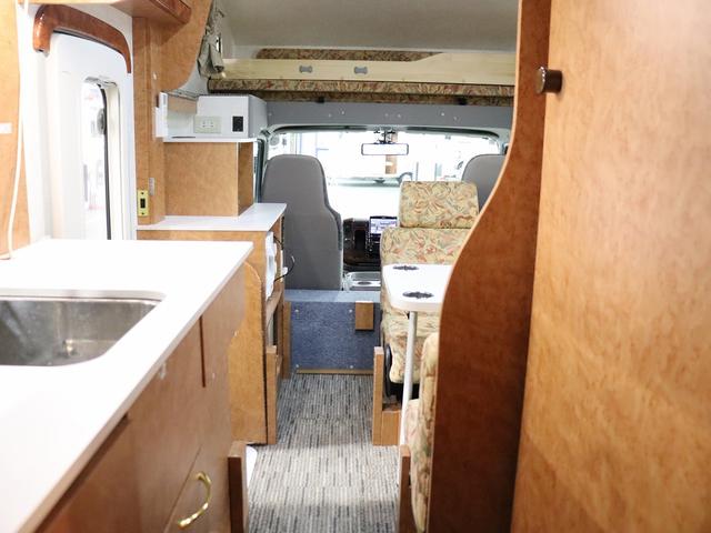 カムロード キャンピング グランド大地 4WD ベバストFFヒーター 家庭用エアコン サブバッテリー DC冷蔵庫 電子レンジ インバーター1500W MAXFAN ガゼルアンテナ Sオーニング 前後社外ショック(3枚目)