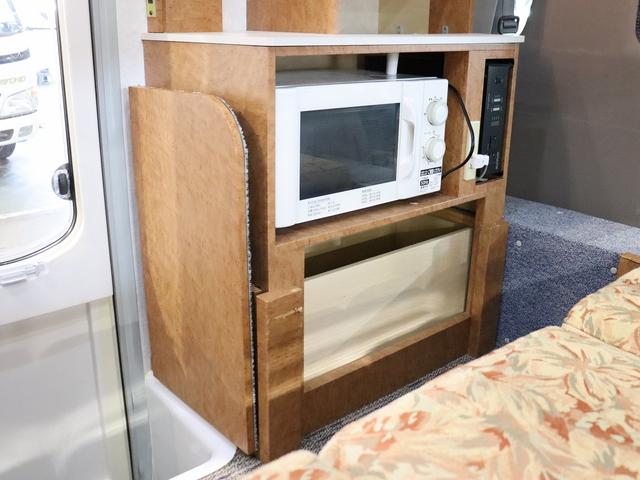 カムロード キャンピング グランド大地 4WD ベバストFFヒーター 家庭用エアコン サブバッテリー DC冷蔵庫 電子レンジ インバーター1500W MAXFAN ガゼルアンテナ Sオーニング 前後社外ショック(17枚目)