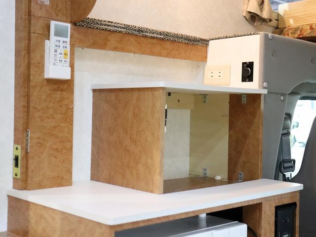 カムロード キャンピング グランド大地 4WD ベバストFFヒーター 家庭用エアコン サブバッテリー DC冷蔵庫 電子レンジ インバーター1500W MAXFAN ガゼルアンテナ Sオーニング 前後社外ショック(18枚目)