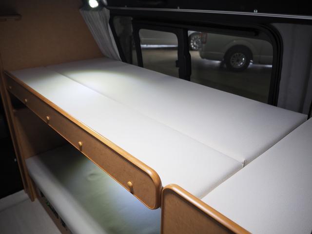 ハイエースバン 　キャンピング　ＯＭＣ　北斗　４ＷＤ　ベバストＦＦヒーター　ツインサブ　インバーター１５００Ｗ　電子レンジ　フレキシブルソーラーパネル　サイドオーニング　ポータブルトイレ　１９型ＴＶ　ナビ切替　ナビ連動（27枚目）