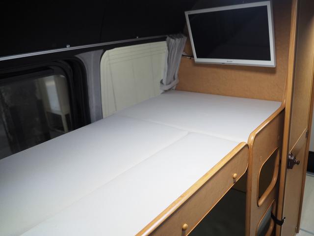 ハイエースバン 　キャンピング　ＯＭＣ　北斗　４ＷＤ　ベバストＦＦヒーター　ツインサブ　インバーター１５００Ｗ　電子レンジ　フレキシブルソーラーパネル　サイドオーニング　ポータブルトイレ　１９型ＴＶ　ナビ切替　ナビ連動（28枚目）