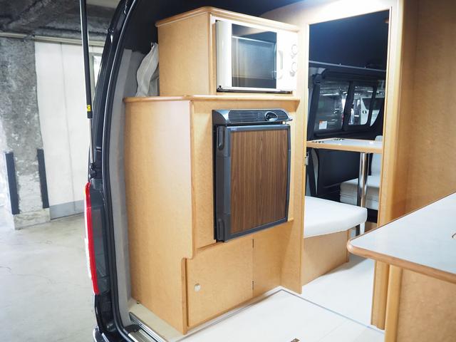 ハイエースバン 　キャンピング　ＯＭＣ　北斗　４ＷＤ　ベバストＦＦヒーター　ツインサブ　インバーター１５００Ｗ　電子レンジ　フレキシブルソーラーパネル　サイドオーニング　ポータブルトイレ　１９型ＴＶ　ナビ切替　ナビ連動（54枚目）