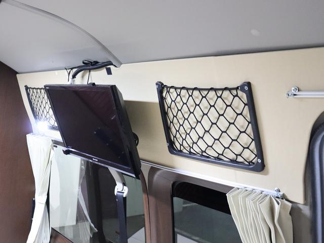 ハイエースバン 　キャンピング　ＯＭＣ　銀河　４ＷＤ　ＦＦヒーター　リチウム３００Ａｈ　インバーター１５００Ｗ　ＤＣ４０Ｌ冷蔵庫　家庭用エアコン　ソーラー１枚　電子レンジ　１９型ＴＶ　フィルムアンテナ　ブリッドシート（41枚目）