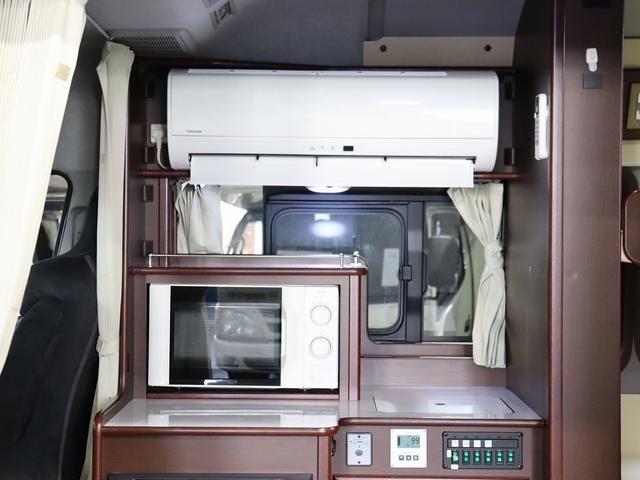 ハイエースバン 　キャンピング　ＯＭＣ　銀河　４ＷＤ　ＦＦヒーター　リチウム３００Ａｈ　インバーター１５００Ｗ　ＤＣ４０Ｌ冷蔵庫　家庭用エアコン　ソーラー１枚　電子レンジ　１９型ＴＶ　フィルムアンテナ　ブリッドシート（44枚目）