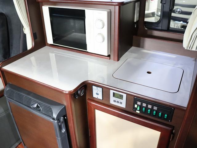 ハイエースバン 　キャンピング　ＯＭＣ　銀河　４ＷＤ　ＦＦヒーター　リチウム３００Ａｈ　インバーター１５００Ｗ　ＤＣ４０Ｌ冷蔵庫　家庭用エアコン　ソーラー１枚　電子レンジ　１９型ＴＶ　フィルムアンテナ　ブリッドシート（49枚目）