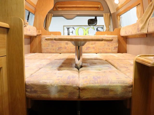 ハイエースバン キャンピング ロングトレイン 4WD ベバストFFヒーター ツインサブ インバーター1500W ルーフベント 電子レンジ ソーラーパネル 19型TV ナビ切替連動 DC冷蔵庫 給排水タンク20Lポリ(33枚目)