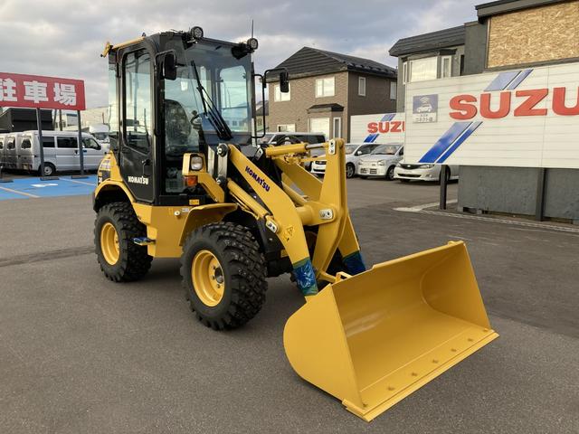 日本 　コマツ　ミニホイールローダー　ＷＡ３０－６Ｅ０　４ＷＤ　未使用　バケット０．５ｍ→０．６ｍへアップグレード　スパイクピン打ち（3枚目）