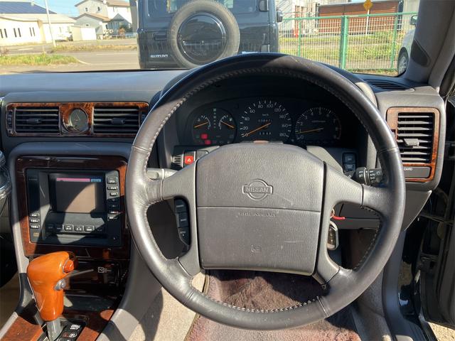 セドリック オートクルーズコントロール アルミホイール オートライト AT キーレスエントリー 電動格納ミラー パワーシート CD カセット エアコン(2枚目)