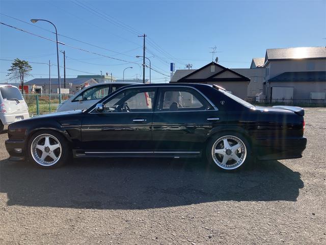 セドリック オートクルーズコントロール アルミホイール オートライト AT キーレスエントリー 電動格納ミラー パワーシート CD カセット エアコン(12枚目)