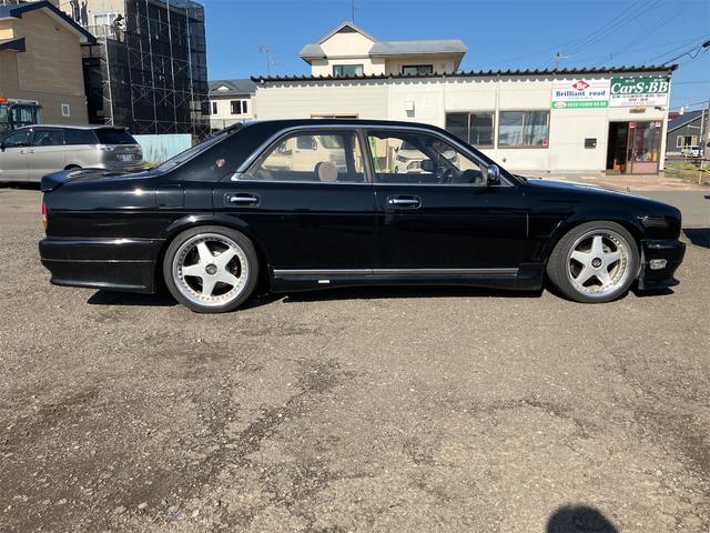 セドリック オートクルーズコントロール アルミホイール オートライト AT キーレスエントリー 電動格納ミラー パワーシート CD カセット エアコン(13枚目)