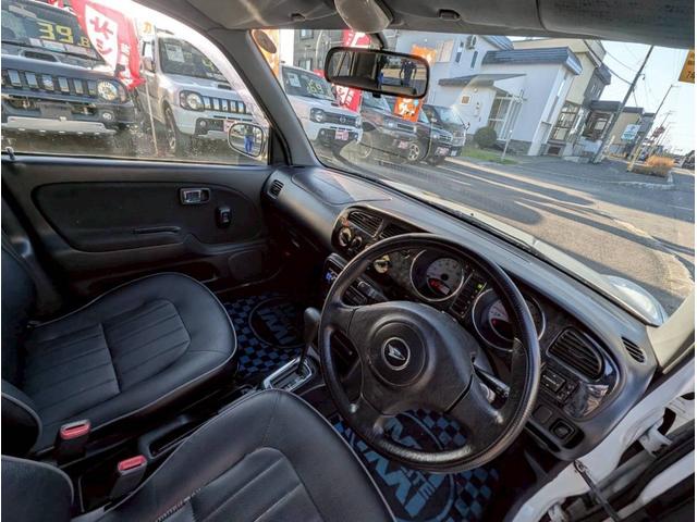 ミラジーノ ミニライトスペシャルターボ　４ＷＤ　ターボ　ミニライトホイール　フォグランプ　電動格納ミラー　ミニライトフロアマット　ハーフレザーシート　オーディオ（12枚目）