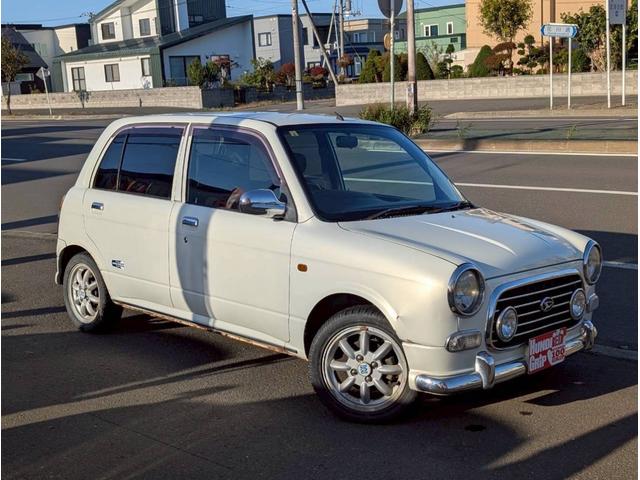 ミラジーノ ミニライトスペシャルターボ　４ＷＤ　ターボ　ミニライトホイール　フォグランプ　電動格納ミラー　ミニライトフロアマット　ハーフレザーシート　オーディオ（13枚目）