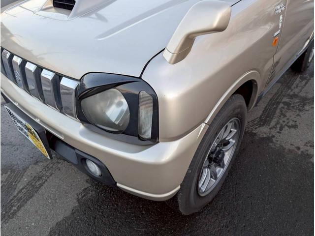 ジムニー ワイルドウインド AT車 社外テール ナビ フォグランプ ハーフレザーシート ドアサイドバイザー 電動格納ミラー ルーフレール スペアタイヤカバー(30枚目)