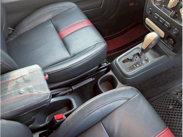 ジムニー ワイルドウインド AT車 社外テール ナビ フォグランプ ハーフレザーシート ドアサイドバイザー 電動格納ミラー ルーフレール スペアタイヤカバー(49枚目)