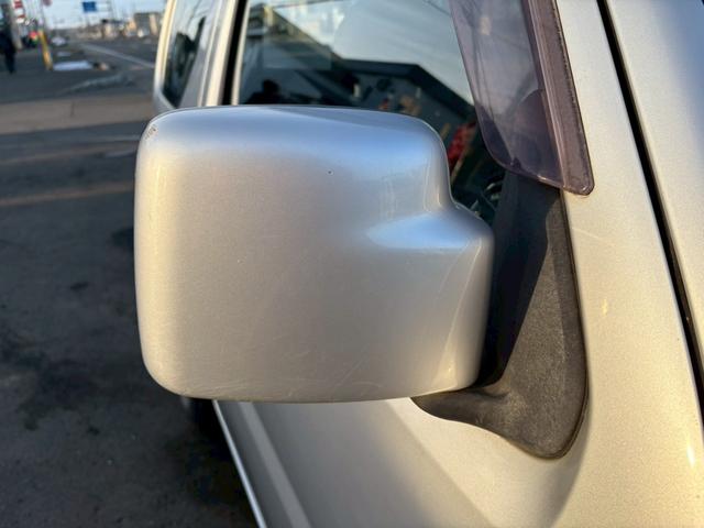 ジムニー ＸＧ　ＡＴ車　ドアサイドバイザー　フォグランプ　ライトレベライザー　ＡＢＳ　４ＷＤ（23枚目）