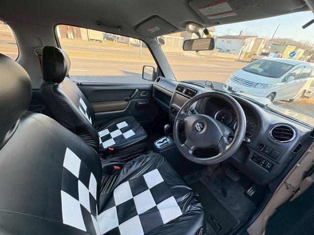 ジムニー ワイルドウインド　ＡＴ車　ナビ　ＥＴＣ　リフトアップ　社外ヘッドライト　社外テールレンズ　電動格納ミラー　フォグランプ　４ＷＤ　ＡＢＳ（12枚目）
