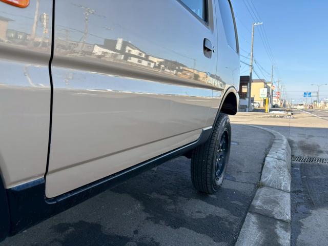 ジムニー ワイルドウインド　ＡＴ車　ナビ　ＥＴＣ　リフトアップ　社外ヘッドライト　社外テールレンズ　電動格納ミラー　フォグランプ　４ＷＤ　ＡＢＳ（19枚目）