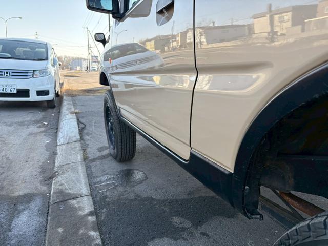 ジムニー ワイルドウインド　ＡＴ車　ナビ　ＥＴＣ　リフトアップ　社外ヘッドライト　社外テールレンズ　電動格納ミラー　フォグランプ　４ＷＤ　ＡＢＳ（21枚目）