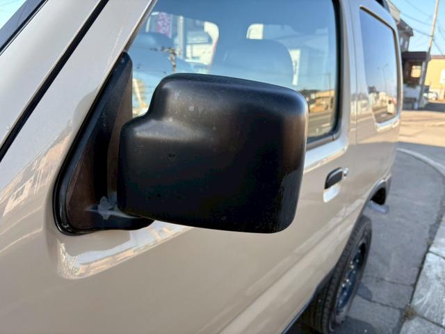 ジムニー ワイルドウインド　ＡＴ車　ナビ　ＥＴＣ　リフトアップ　社外ヘッドライト　社外テールレンズ　電動格納ミラー　フォグランプ　４ＷＤ　ＡＢＳ（22枚目）