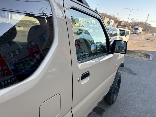 ジムニー ワイルドウインド　ＡＴ車　ナビ　ＥＴＣ　リフトアップ　社外ヘッドライト　社外テールレンズ　電動格納ミラー　フォグランプ　４ＷＤ　ＡＢＳ（25枚目）