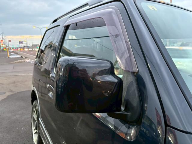 ジムニー ランドベンチャー　ＡＴ車　オーディオ　ドアサイドバイザー　電動格納ミラー　フォグランプ　ハーフレザーシート　　スペアタイヤ　４ＷＤ　ＡＢＳ（21枚目）