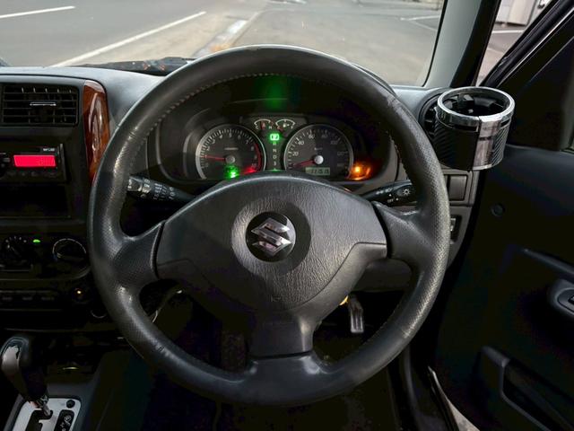 ジムニー ランドベンチャー　ＡＴ車　オーディオ　ドアサイドバイザー　電動格納ミラー　フォグランプ　ハーフレザーシート　　スペアタイヤ　４ＷＤ　ＡＢＳ（32枚目）