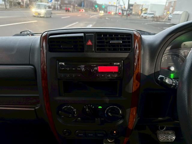 ジムニー ランドベンチャー　ＡＴ車　オーディオ　ドアサイドバイザー　電動格納ミラー　フォグランプ　ハーフレザーシート　　スペアタイヤ　４ＷＤ　ＡＢＳ（34枚目）