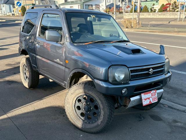 ジムニー ランドベンチャー　ＡＴ車　リフトアップ　オーディオ　電動格納ミラー　ドアサイドバイザー　オフロードタイヤ　４ＷＤ　ＡＢＳ（13枚目）